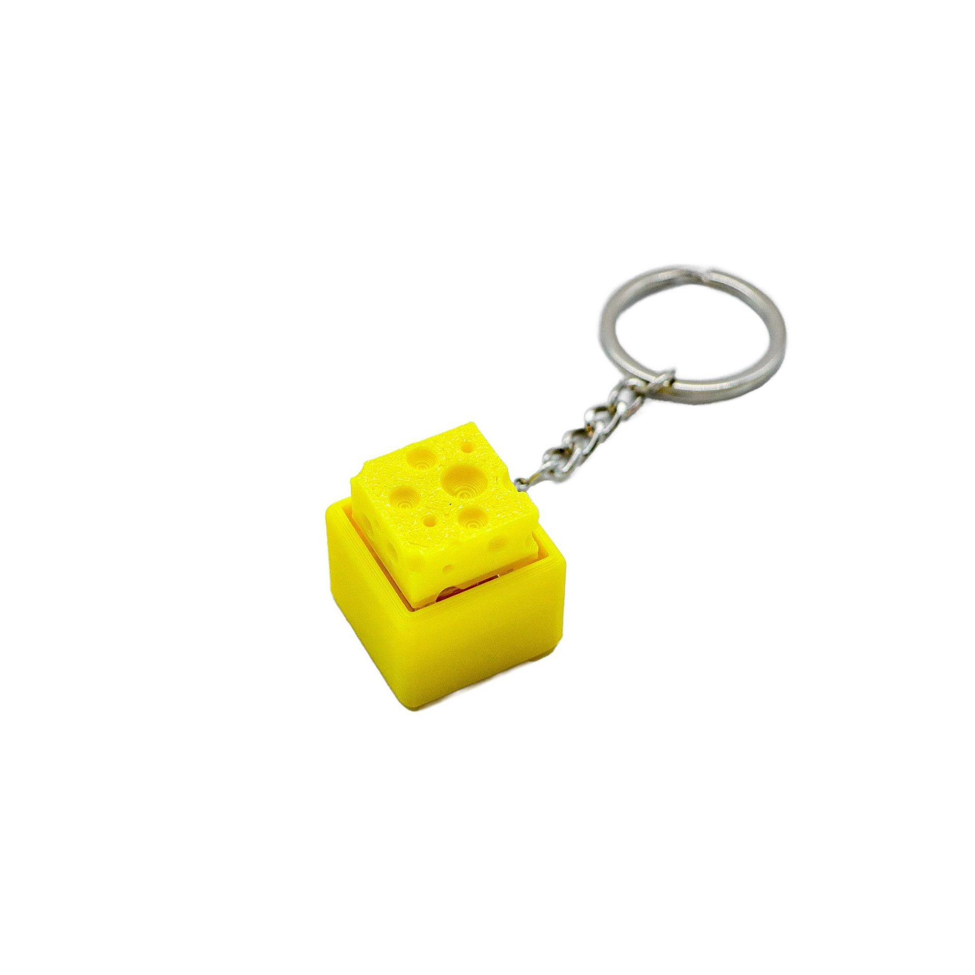 سلسلة مفاتيح بتصميم جهاز تحكم  - مراجعة 3D Printing Toys وسعره